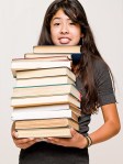 book pile with teen girl
